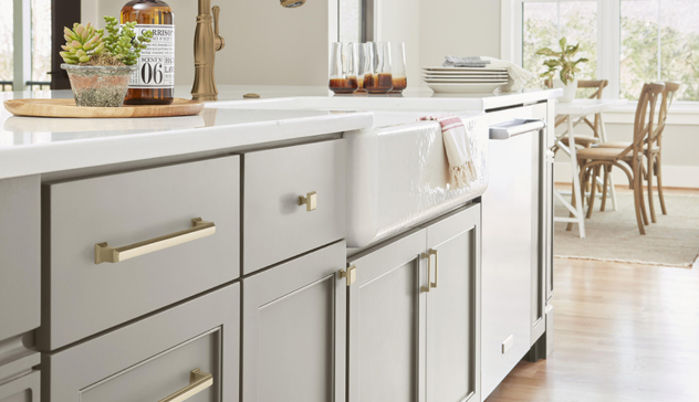 White Oak Shaker Cabinets Classic shaker cabinetry with white oak texture and subtle brass pulls, showcasing craftsmanship that balances durability and elegance.