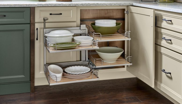 A functional image displaying corner cabinetry with rotating trays and tiered storage levels. Include white or wood-tone cabinetry and quartz countertops, illustrating how these designs save space in compact kitchens.