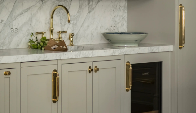 Vintage Fixtures and Brass Hardware Finishes Close-up of brass handles, knobs, and faucets with patina.
