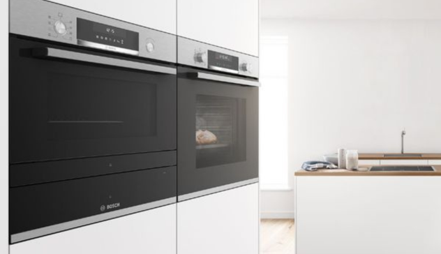 Appliances concealed within cabinetry for a refined, streamlined finish.